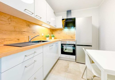 Charmante 2-RW* 1. OG* frisch saniert* EBK* moderne Möblierung* TG-SP* Süd-Balkon & Terrasse* Aufzug