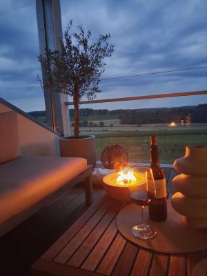 Neuwertige Dachterrassenwohnung mit unverbaubarem Ausblick.