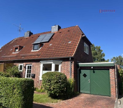 Doppelhaushälfte mit Anbau und Garage in 24106 Kiel-Wik