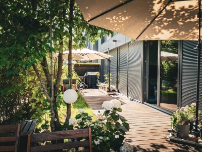 *Spektakuläre Erdgeschosswohnung mit Privatterrasse und eigenem Garten im exklusiven "The Mile"*