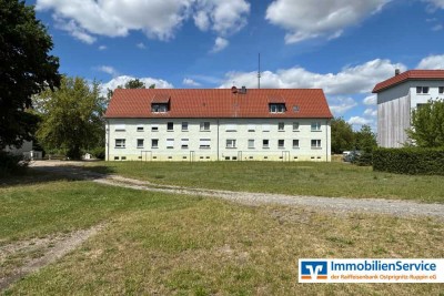 Geflegte 4-Zi.-Erdgeschosswohnung mit Gartenblick, zwei Kellerräumen und Garagenoption!