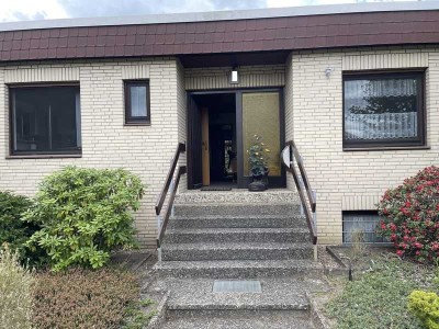 Wohlfühl-Bungalow mit Wintergarten und Tiefgarage in familienfreundlicher Lage
