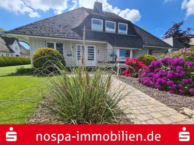 Gepflegtes Einfamilienhaus mit genehmigter Ferienwohnung, 5 Bädern, 2 Terrassen und Sauna