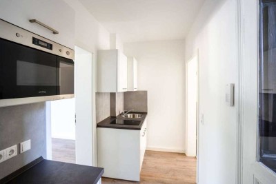 Studio-Erdgeschoss-Wohnung mit Einbauküche