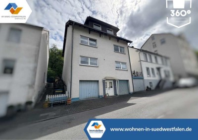 VR IMMO: Zweifamilienhaus mit zwei Garagen in Zentrumsnähe von Werdohl zu verkaufen.