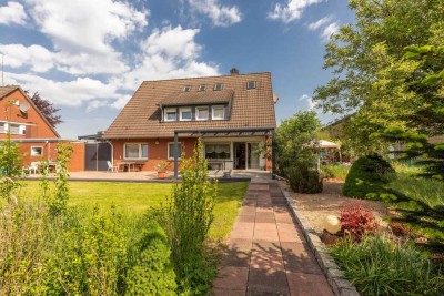 Großzügiges Familienhaus mit sonnigem Garten in guter Lage
