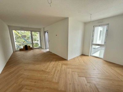 Erstbezug mit Balkon und Einbauküche: Geschmackvolle 1-Zimmer-Wohnung mit geh. Innenausstattung