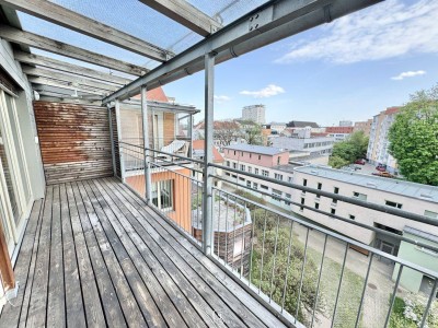 Geräumige Dachgeschosswohnung mit überdachten Süd-Balkonen in zentraler Lage