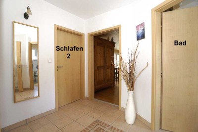 Platz für Ideen und Familie: Zweifamilienhaus mit Garten und Wohnkomfort