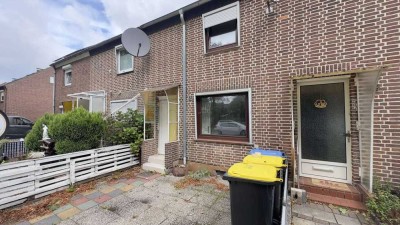 Charmantes Reihenmittelhaus mit Wintergarten, Garten und Garage in familienfreundlicher Lage