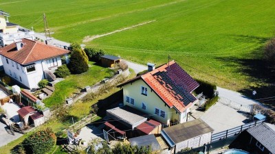 Liebenswertes Einfamilienhaus mit Gartenidylle, Terrasse und Carport in Eugendorf