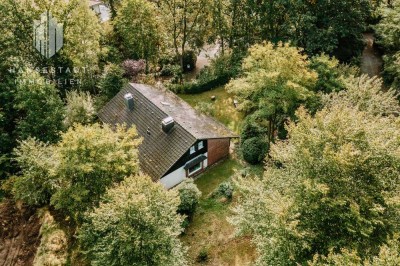 Charmantes Einfamilienhaus auf großzügigem Hanggrundstück in Jesteburg