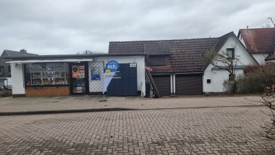 Wohnung und Gewerbefläche inkl. Garagen