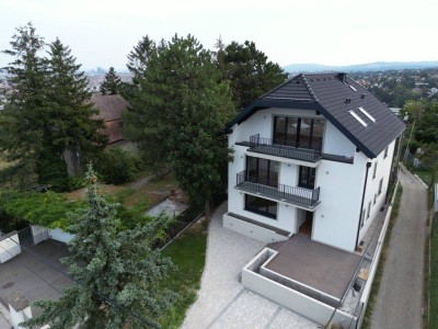 Luxuriöser Erstbezug mit Blick über Wien | Indoor-Pool | 2 Terrassen + 4 Balkone | Parken