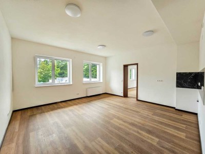 Wohnen im Grünen: Kernsanierte 2-Zimmer-Oase für Ruhesuchende