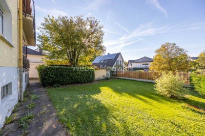 DONRATH: geräumiges 2-Parteienhaus (freistehend) mit Garten, 2 Garagen + Stellplätzen