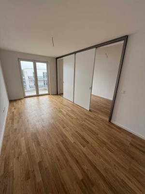 Erstbezug: Moderne 2-Zimmer-Neubauwohnung mit Balkon & Tiefgaragenstellplatz im Ludwig Quartier