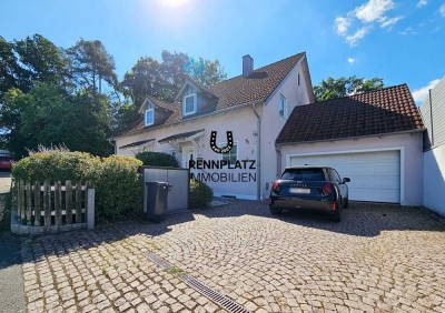 Ansprechende DHH mit EBK, Doppel-Garage und großem Garten in Laaber. Frei.