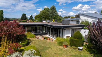 Engel & Völkers: Architektenbungalow mit Weitblick