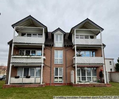 Schicke Dachgeschosswohnung mit Balkon und Garage
