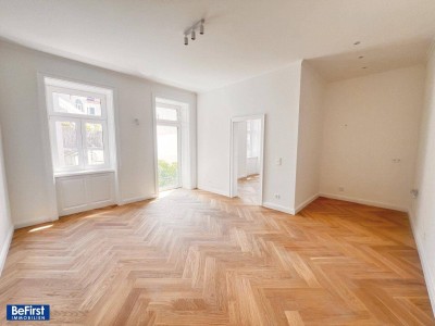 Prachtvoll sanierte Balkonwohnung - ruhige Hofgartenlage