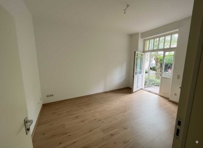 Wohnen im Denkmal - 2-Zimmer-Hochparterre-Wohnung mit Balkon in Hüttenheim
