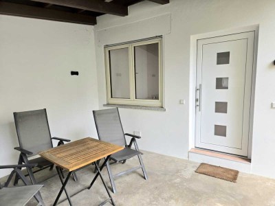 Kleine Erdgeschosswohnung im Anbau eines Einfamilienhauses