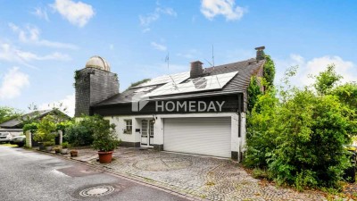 Großzügiges Einfamilienhaus mit parkähnlichem Garten, besonderer Architektur & toller Ausstattung
