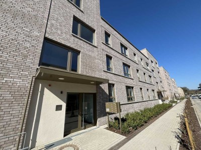 Hochwertiger Neubau! Geräumige 3-Zimmer-Wohnung mit Tiefgaragenplatz