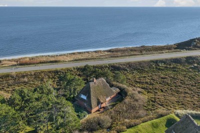 Freistehendes Einzelhaus unter Reet auf Erbpacht-Grundstück in der Westerheide mit Meerblick