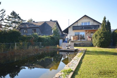 Keine Energiekosten! Ausbaufähiges EINFAMILIENHAUS MIT SCHWIMMTEICH und großem Grundstück