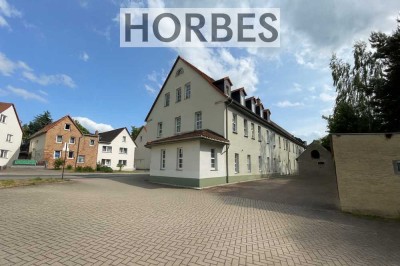 Wohn- und Geschäftshaus in guter Lage von Kayna