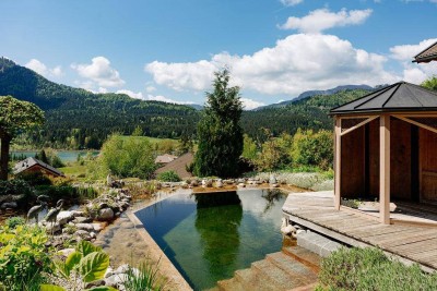 Wohnen, wo andere Urlaub machen – Haus am Weißensee mit Privatbadeteich