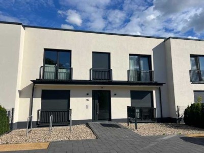 Exklusive Zweizimmerwohnung mit Terrasse, Garten und Keller