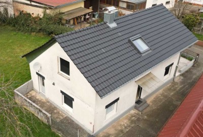 Gemütliches Einfamilienhaus mit angrenzendem Gartengrundstück – Ihr idyllisches Zuhause!