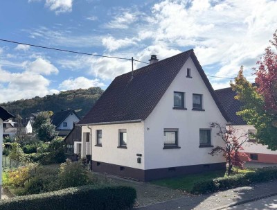 Charmantes Siedlungshäuschen mit Potenzial und großem Garten