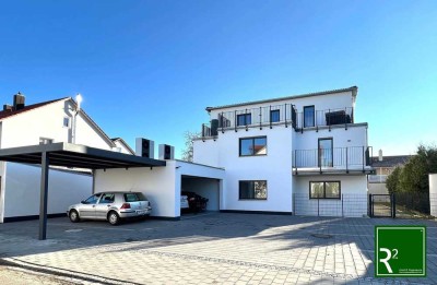 4-Zimmer Wohnung im Erdgeschoss mit sonnigem Gartenanteil in energieeffizientem 5 Familienhaus