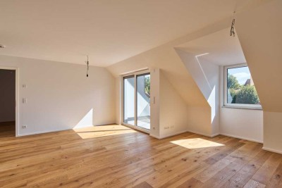Moderne Neubau-Dachgeschosswohnung – Sorglos investieren im Münchner Süden