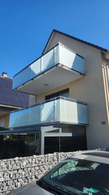 Stilvolle 3-Zimmer-DG-Wohnung mit gehobener Innenausstattung mit Balkon und Einbauküche in Bodenheim