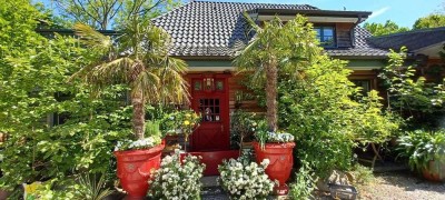 EINZIGARTIGES GESCHÄFTS-und WOHNHAUS mit TRAUMGARTEN DIREKT IM ORTSKERN VON OSTSTEINBEK ZU VERKAUFEN