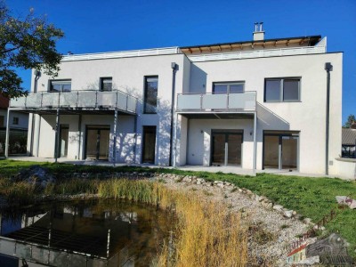 Moderne 3-Zimmerwohnung mit Gartenanteil (ca. 86m²) und Zugang zu Schwimmteich wartet auf Sie!