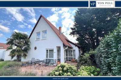 Stilvoller Bungalow mit nachträglich ausgebautem Dachgeschoss und traumhaftem Garten