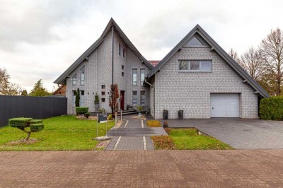 Modernes Einfamilienhaus inmitten beeindruckender Moorlandschaft