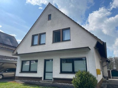 Vielfältig nutzbares Einfamilienhaus mit Garten und Einliegerwohnung in bevorzugter Wohnlage