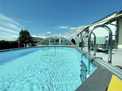 Einfamilienhaus mit hochwertiger Bauweise und beheiztem Pool - Endenergiebedarf nur 12 kWh