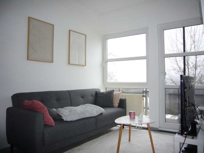 Gemütliche Dachgeschosswohnung mit Balkon & Einbauküche in Siegen