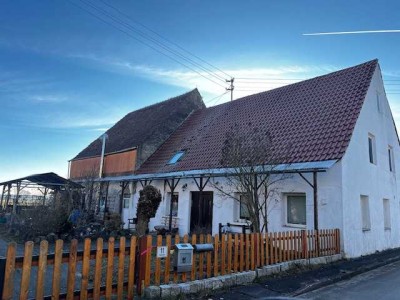 Großzügiges Grundstück mit Haus und Baugenehmigung für zwei Reihenhäuser in Schwörsheim