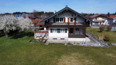 Charmantes Einfamilienhaus mit Bergblick und optionalem Baupotenzial für ein DH und ein EFH