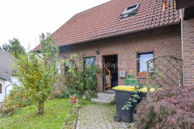 Einseitig angebautes EFH mit Balkon und großem Garten