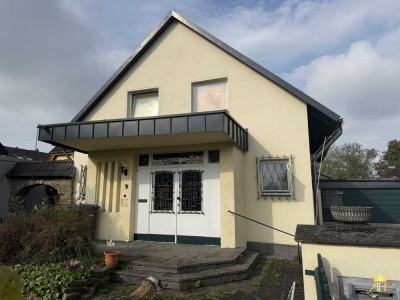 Freistehendes Einfamilienhaus mit viel Potenzial in begehrter Wohnlage !